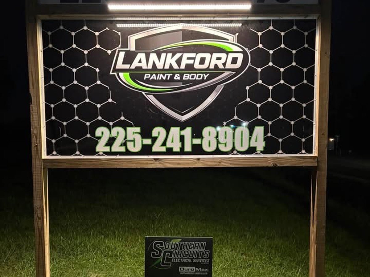 Lankford Paint and Body roadside sign on Post Office Road showing (225) 241-8904